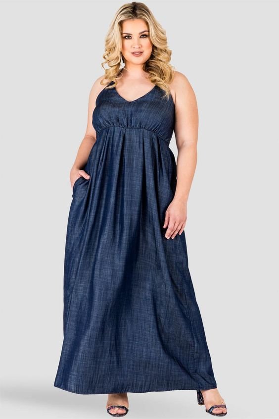 Plus Size Nimah A-Line Tencel Denim Maxi Dress , Sleeveless Plus Size Denim Dress, Long Denim Dress Plus Size. Plus Size Denim maxi dress features a stunning A-line ball gown silhouette (with pockets!) that is vaguely reminiscent of the 50s. Love this denim maxi dress with pockets for plus size.