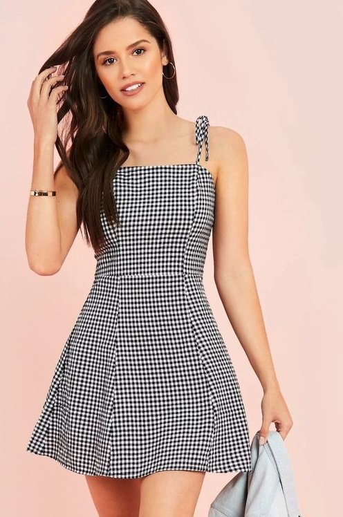 Black and White Gingham Knot Shoulder A-Line Mini Slip Dress For Women. This form fitting summer mini slip dress in an A-line silhouette in a cute black and white Gingham pattern for women